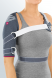 Купити Бандаж плечовий з функцією обмеження рухливості OMOMED – правий з доставкою додому в інтернет-магазині ортопедичних товарів і медтехніки Ортоп